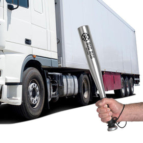 BIG RIG DEFENSE thumper in use on a semi dual tire for fast inflation checks