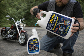 Bike Brite foaming spray on motorcycle surface demonstrating easy degreasing