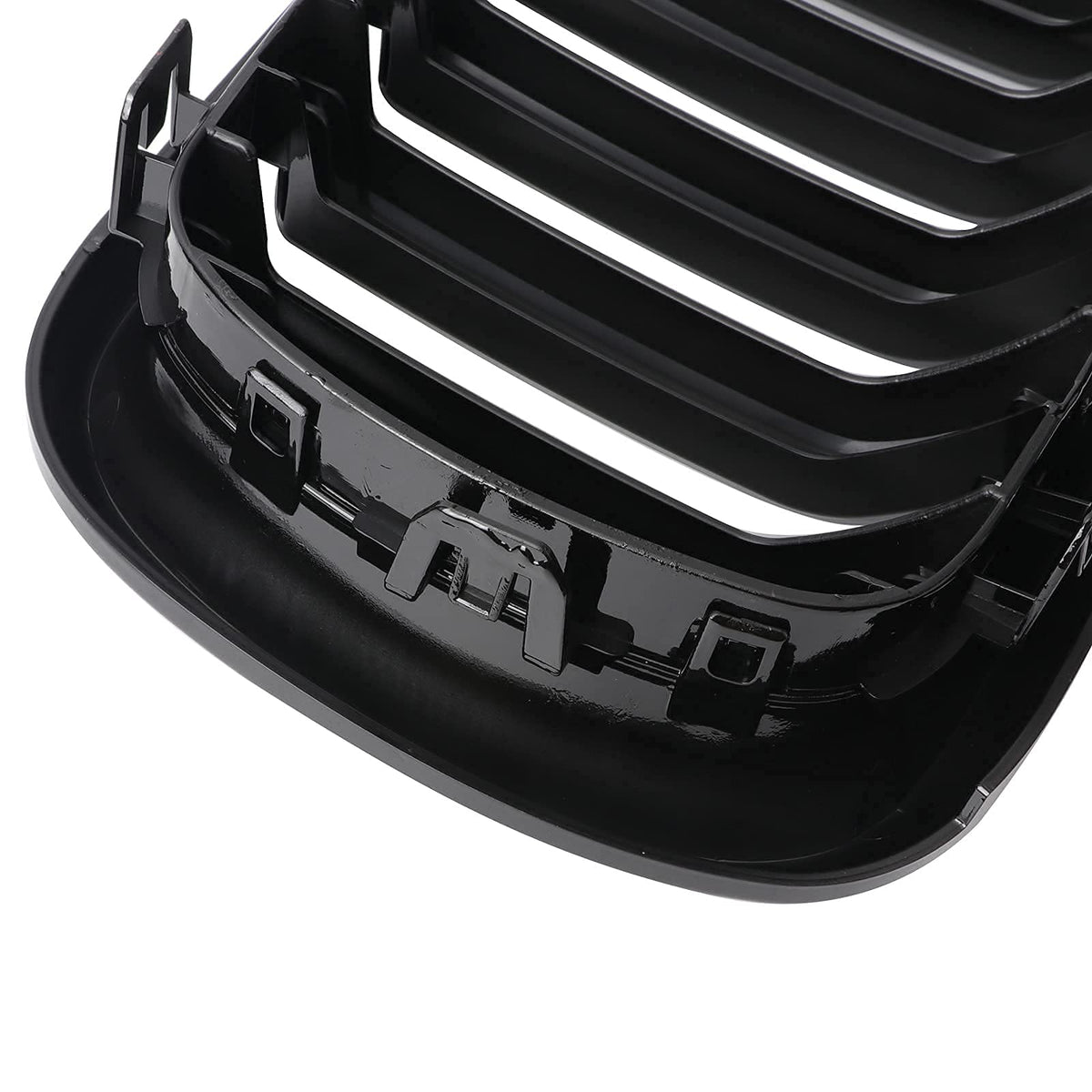 BILLDIO grille on a black X5 in driveway conveying showroom appeal