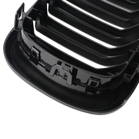 BILLDIO grille on a black X5 in driveway conveying showroom appeal