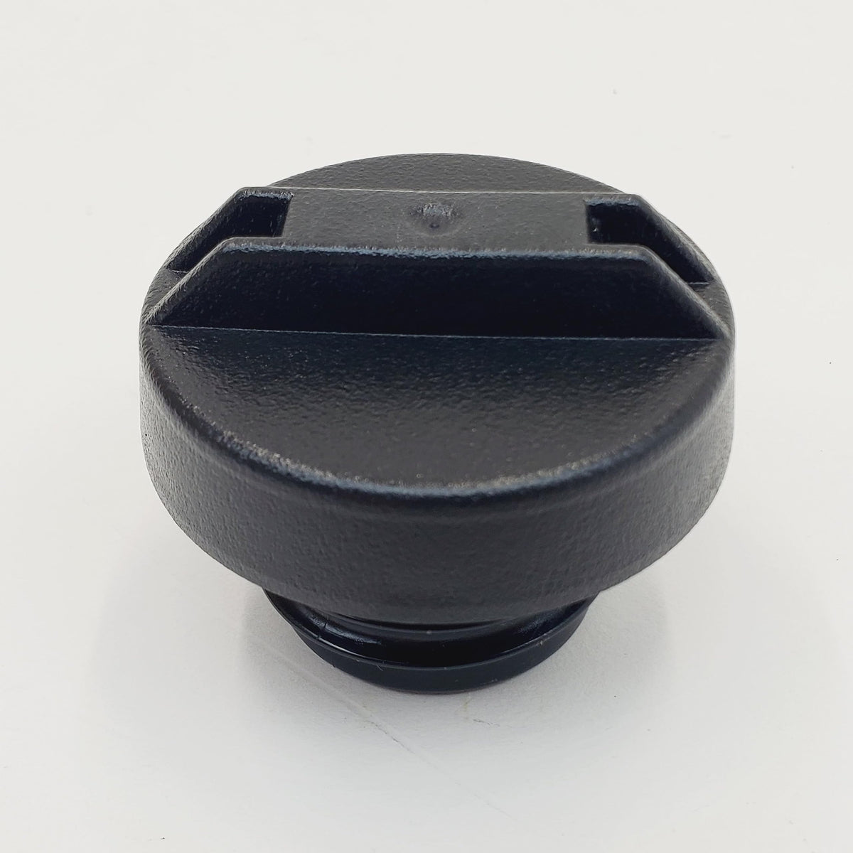 Billet Proof Designs gas cap installed on a Road King fuel door demonstrating proper OEM fit