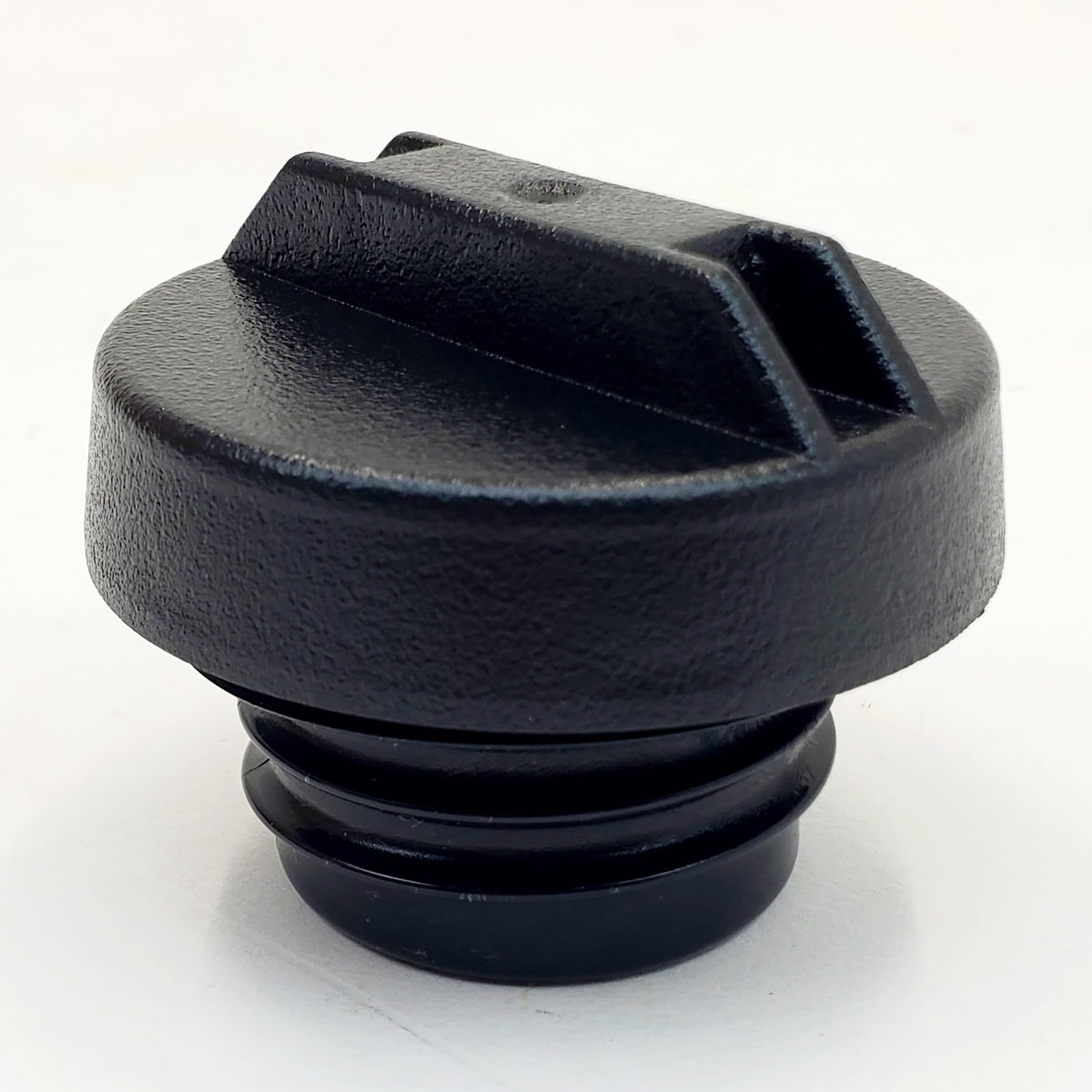 Billet Proof Designs front view of black plastic gas cap showing original equipment styling and fit