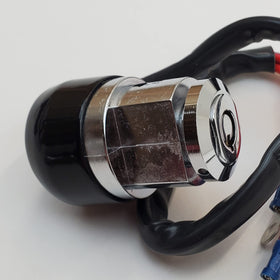 Two tamper-resistant round keys with Billet Proof position sticker for clear ignition settings
