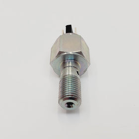 Billet Proof Designs switch installed on Harley rear brake line showing functional fit