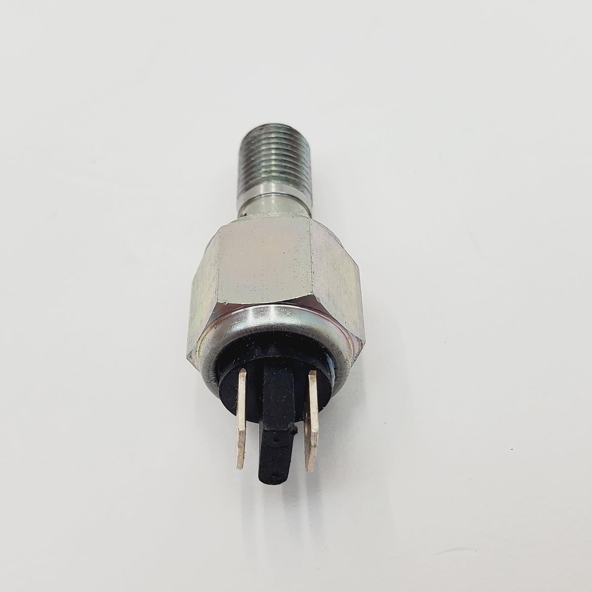 Billet Proof Designs switch next to ruler for size and scale verification before installation