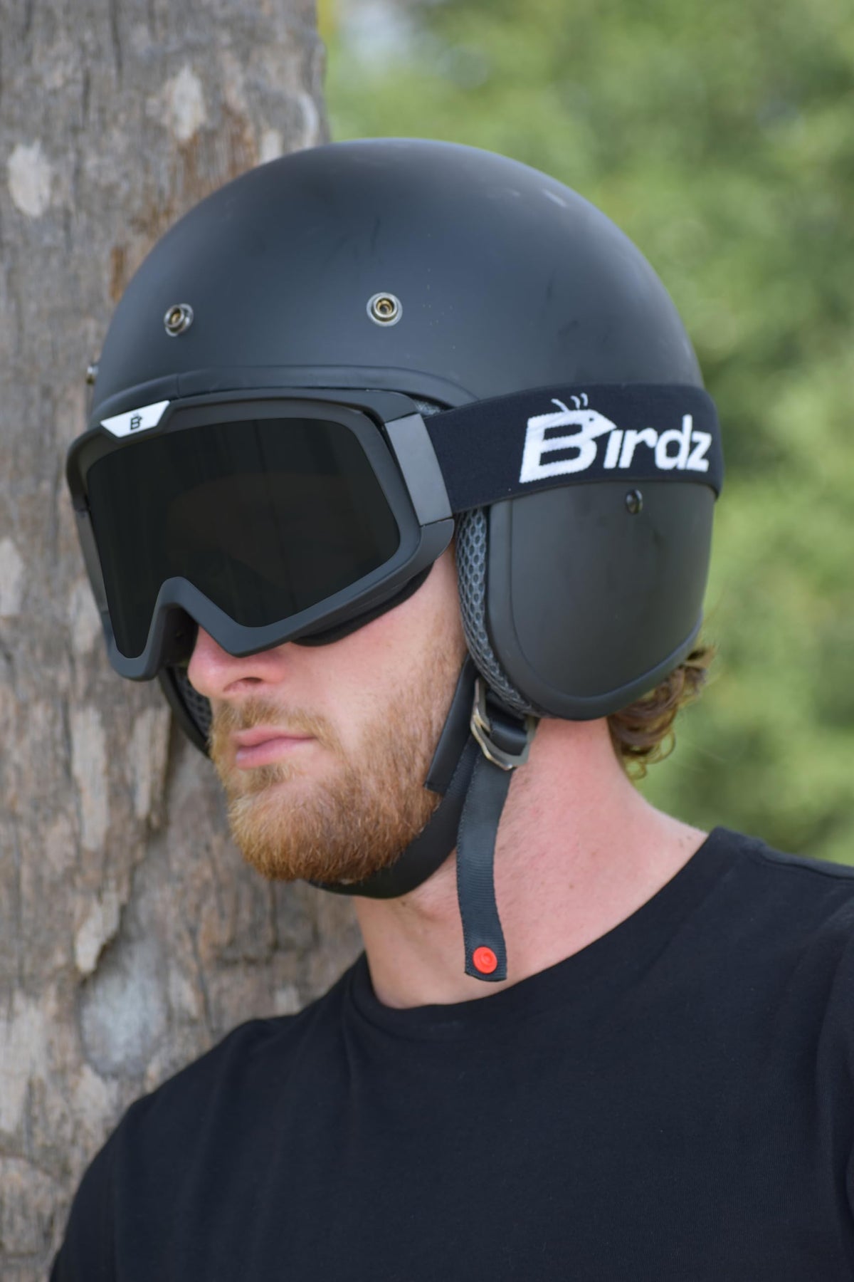 Birdz Pelican worn by rider on ATV illustrating wind and debris protection
