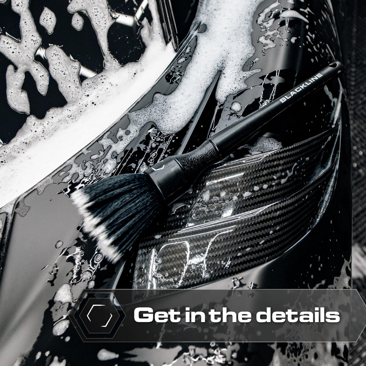 Blackline brushes detailing exterior emblem for scratch-free finish
