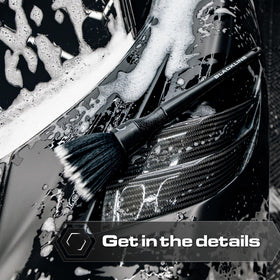 Blackline brushes detailing exterior emblem for scratch-free finish