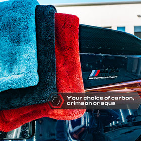 Blackline towel in driveway after wash demonstrating practical use and time savings