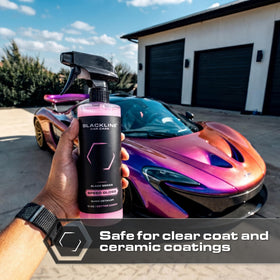 Blackline bottle held in hand showing 16 fl oz size and portability
