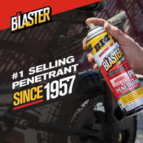 Blaster in workshop being used with wrench demonstrating practical loosening benefit