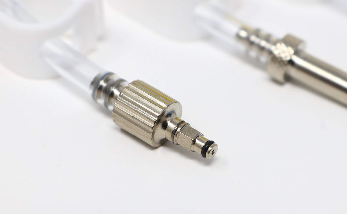 BleedZone kit next to common tools illustrating compact size