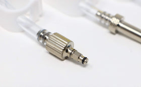 BleedZone kit next to common tools illustrating compact size