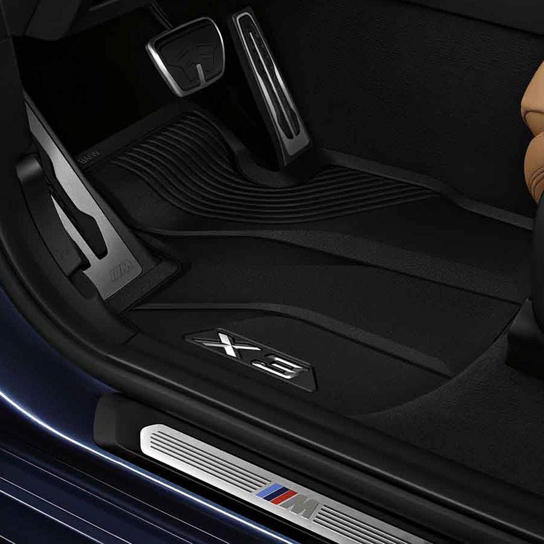 BMW all-weather front mats displayed flat showing textured surface and edge lip protecting carpet