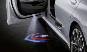 BMW M Performance close-up of a single slide revealing crisp Motorsport-color artwork and fit