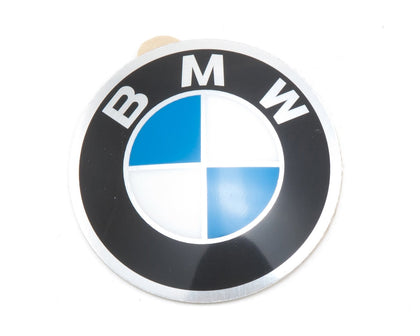BMW plaque front view showing OEM finish and accurate 45mm size for authentic look