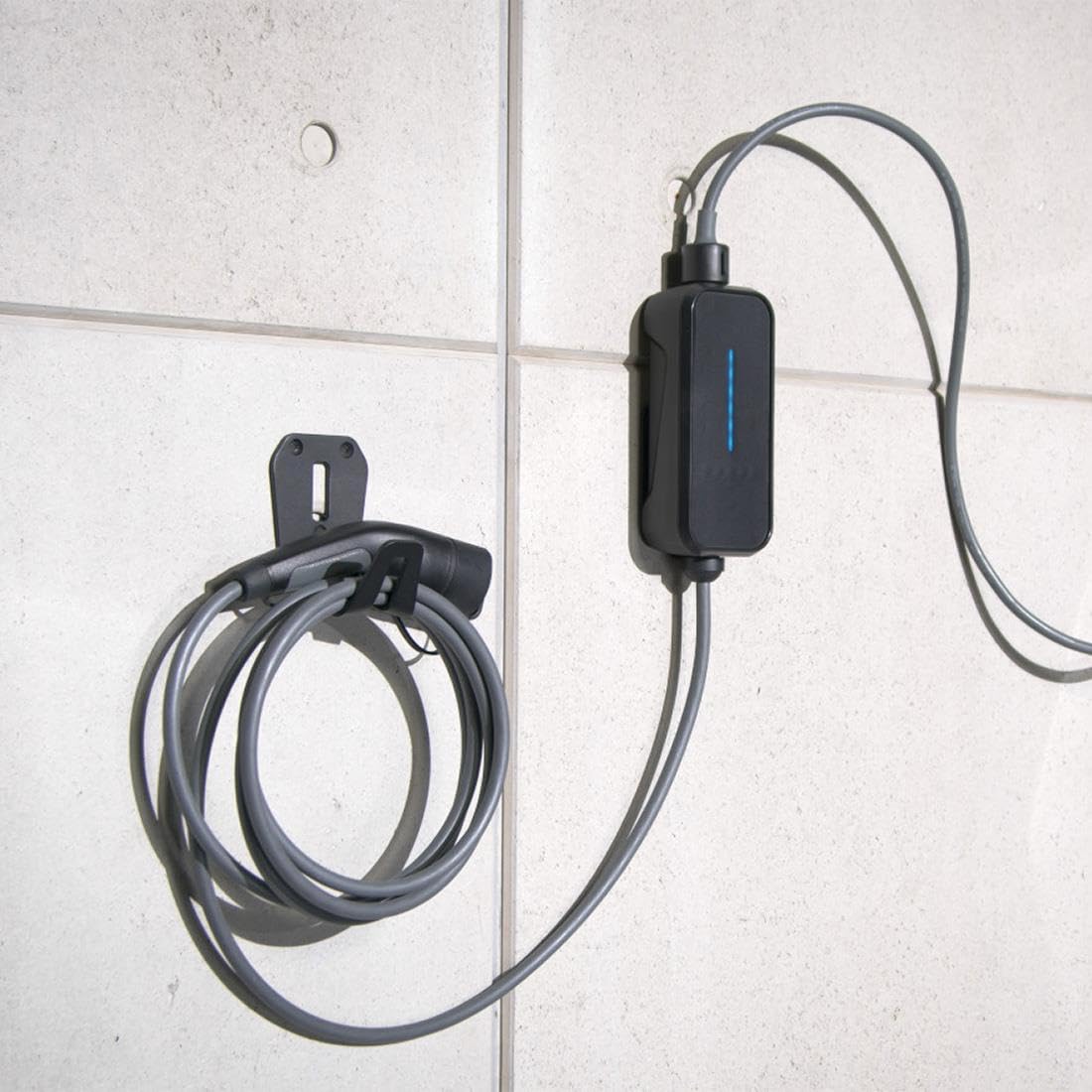 BMW wallmount installed in garage demonstrating neat storage and quick access