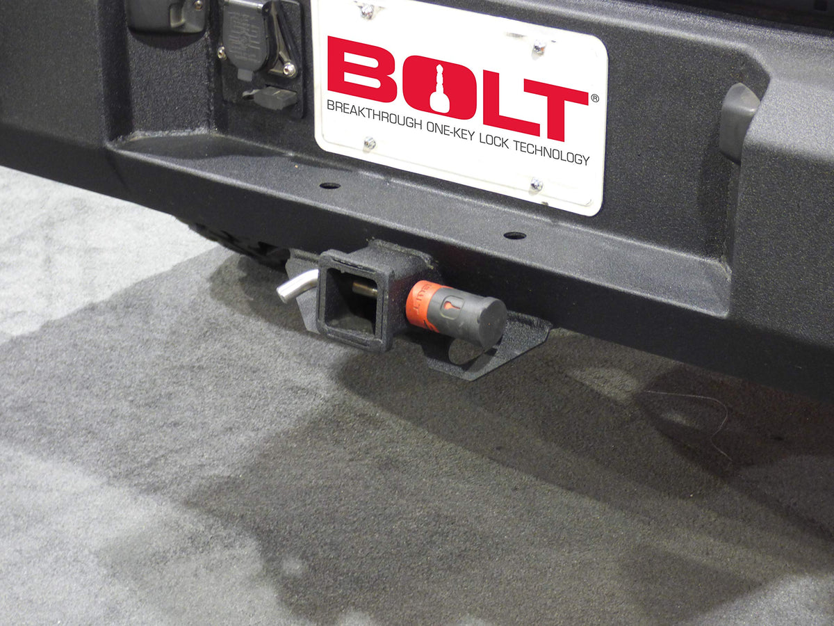 BOLT lock next to ruler for scale illustrating 5/8 inch pin size and fitment