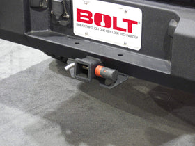 BOLT lock next to ruler for scale illustrating 5/8 inch pin size and fitment
