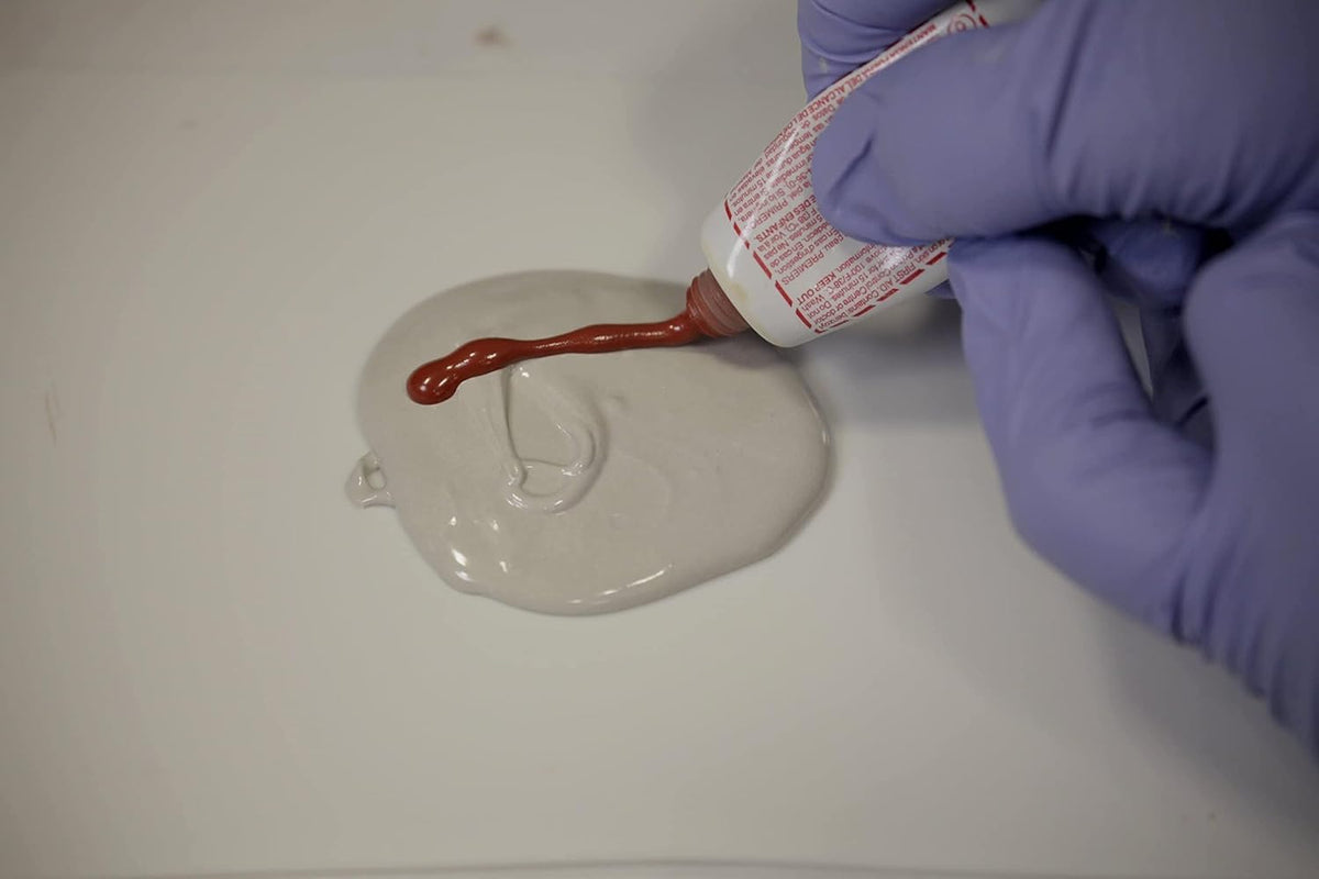 bondo cream hardener tube displayed beside filler for correct mix ratio