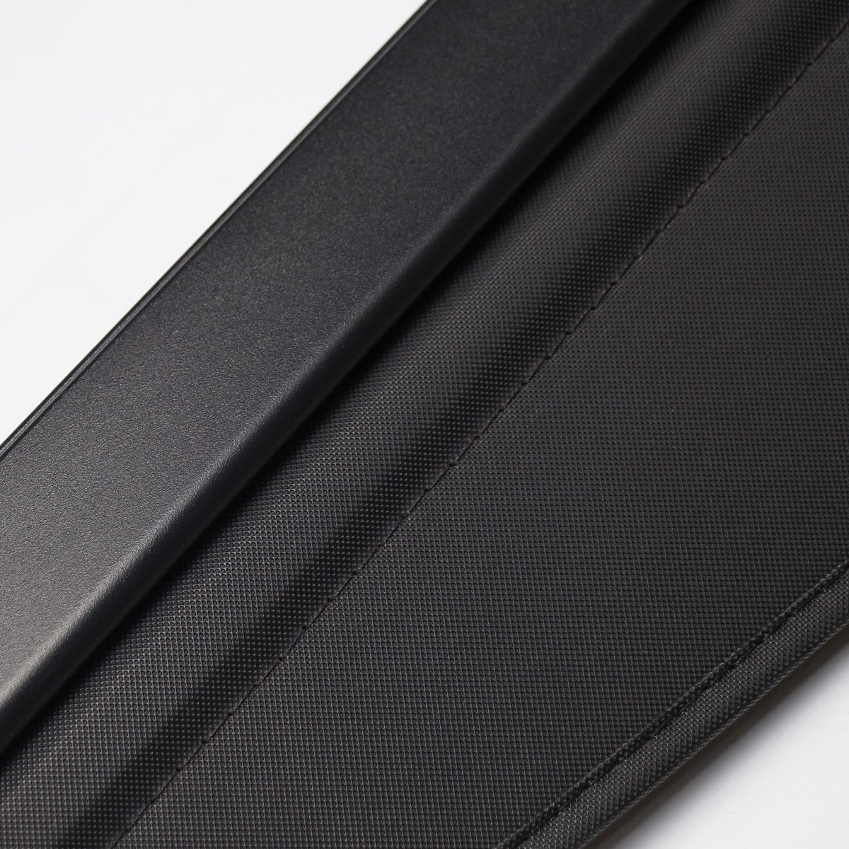 BOPARAUTO size comparison with suitcase demonstrating coverage and scale