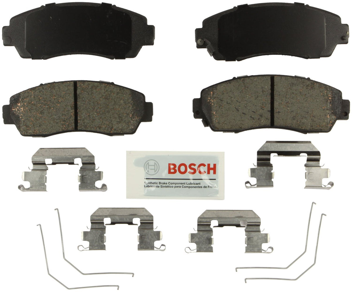 Bosch BE1521H front pads in box showing included hardware and towel, clear fitment benefit