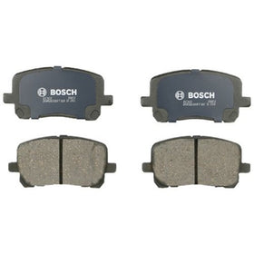 Bosch ceramic pad closeup highlighting friction surface and molded shim for quiet stops