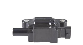 Bosch ignition coil next to ruler showing compact size and installation scale