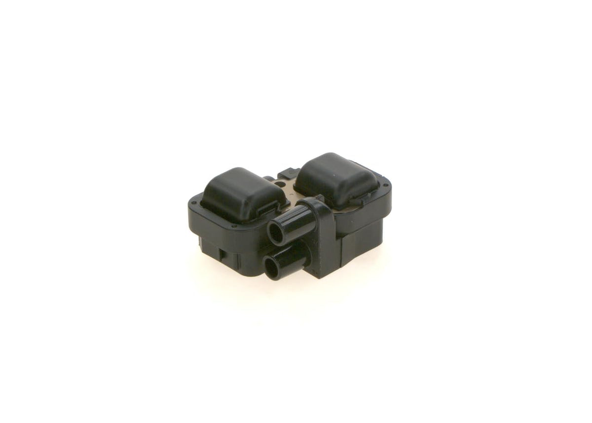 Bosch ignition coil next to ruler for scale showing correct dimensions