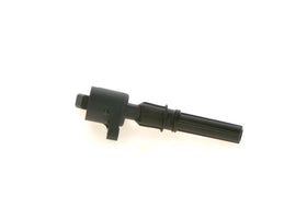 Bosch ignition coil next to ruler size comparison showing compact direct-fit dimensions