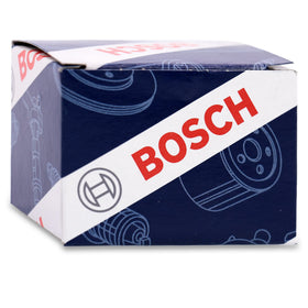 Bosch MAP sensor next to a ruler for scale showing compact design and fitment clarity