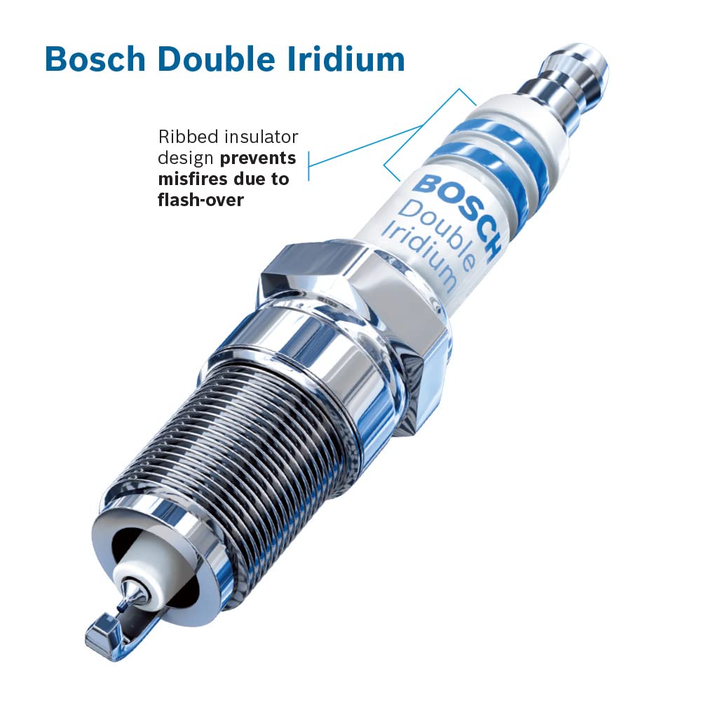 Bosch spark plug beside ruler for size and scale reference