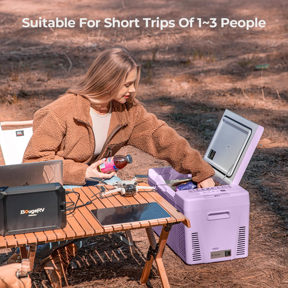 BougeRV next to a water bottle showing 23 quart scale for packing efficiency