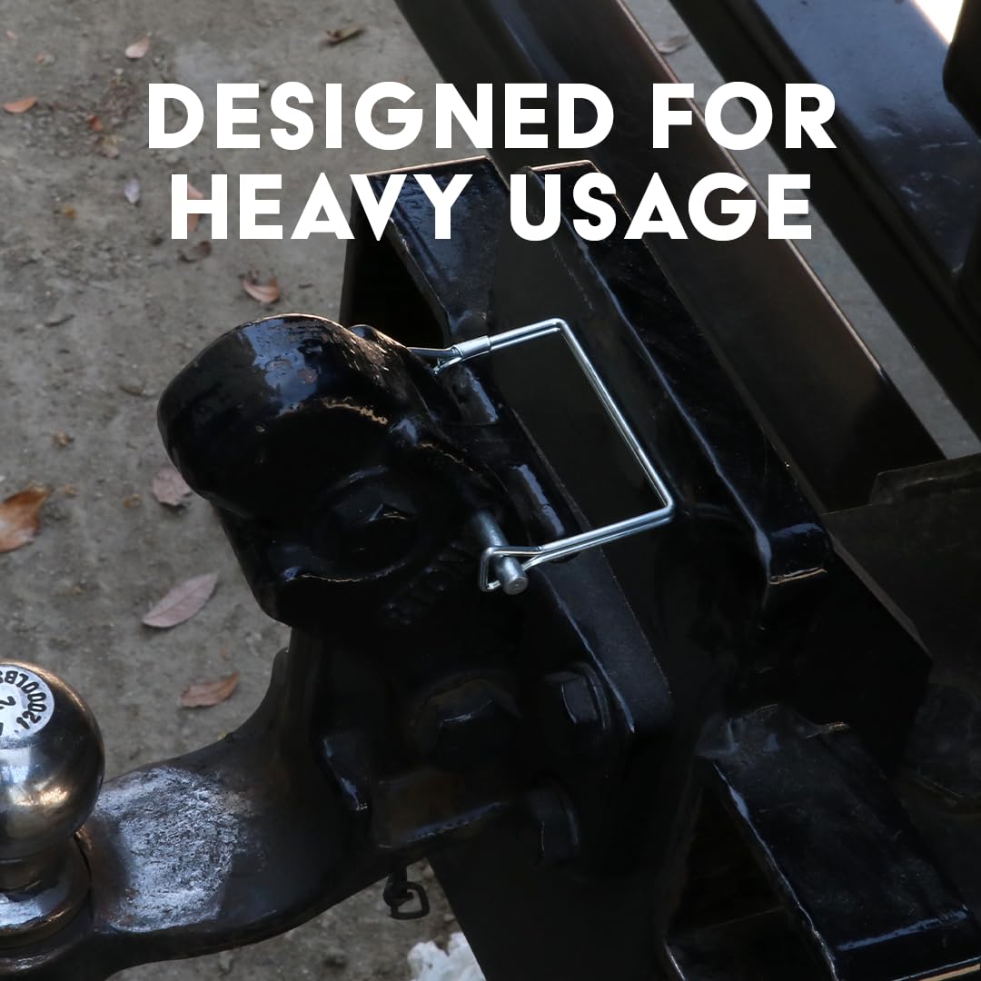 Boxer pins on a worksite with trailer and tools demonstrating durability