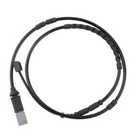 BOXI sensor installed on a BMW brake pad demonstrating correct routing and secure clip retention