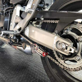 BPA-RACING in garage lifestyle shot, convenient easy chain adjustments