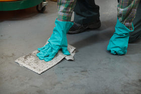 Brady pad absorbing oil spill demonstrating fast uptake and reduced re-drip