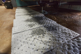 Brady stack of pads in case showing bulk supply for convenient storage and access