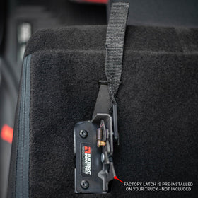 BuiltRight in truck lifestyle scene demonstrating fast behind-seat storage access