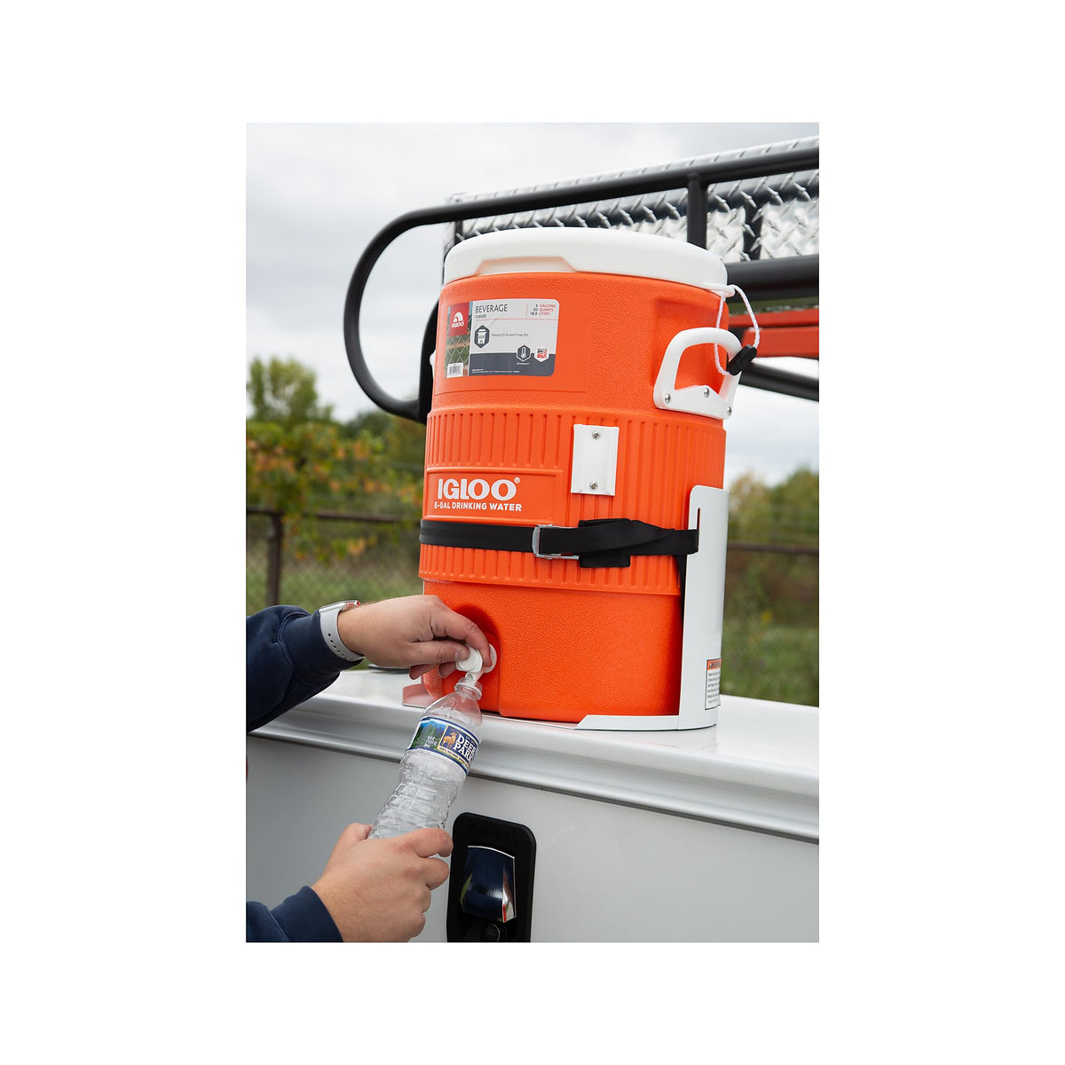 Buyers Products rack holding a 5‑gallon jug demonstrating secure fit and spill prevention benefit