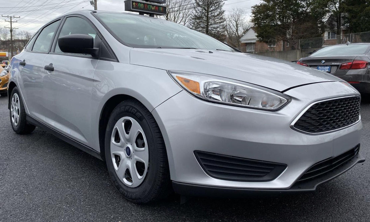 BXZ driver-side bezel installed on Ford Focus showing improved front look