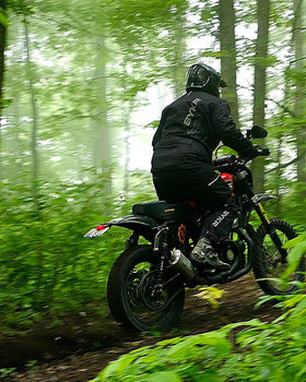 BYKR lifestyle shot on adventure bike illustrating touring readiness