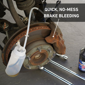 Cal-Spec Tools cap-mounted 20lb magnet holding bottle securely on metal surface