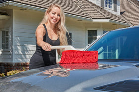 California duster in use on car hood showing fast exterior dust removal