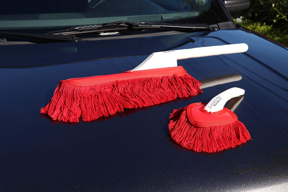 California mini dash in use on dashboard showing precise interior cleaning