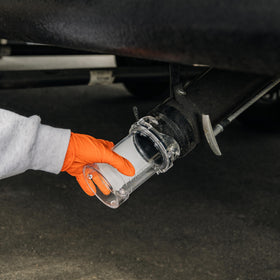 Camco extender beside ruler showing compact 5-inch extension for convenience benefit