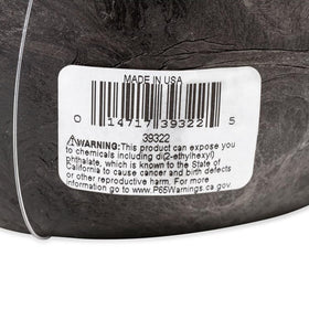 Camco held in hand for scale showing lightweight size and portability benefit