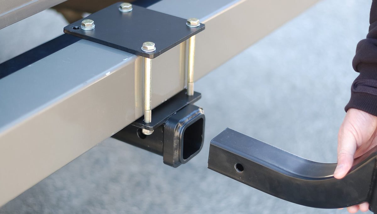 Camco clamp detail on bumper showing sturdy attachment and anti-rattle benefit
