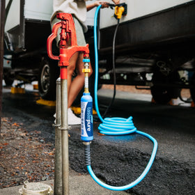 Camco EVOFlex in campsite setting for clean drinking water on trips