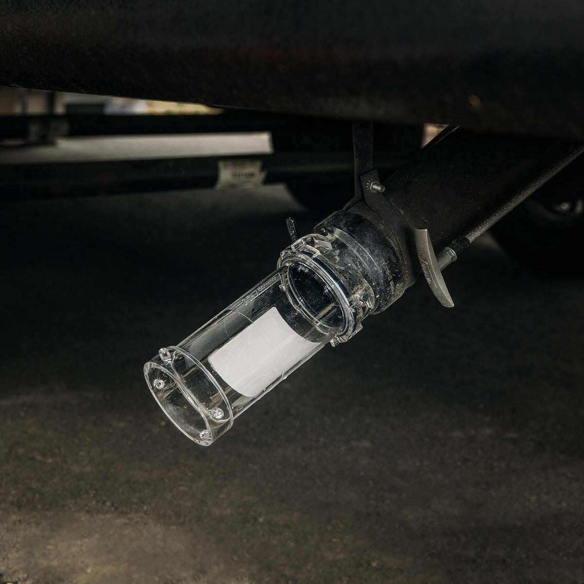 Camco translucent chamber detail revealing flow visibility for confident rinsing